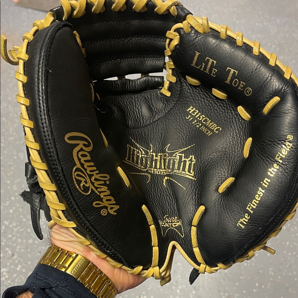 Rawlings Black Glove with Gold Stitching